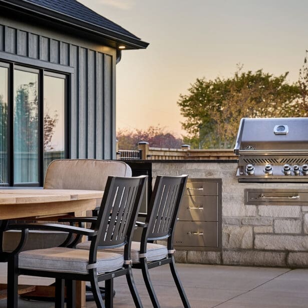 A well-designed outdoor BBQ area featuring a built-in grill and spacious countertop, perfect for cooking and entertaining.