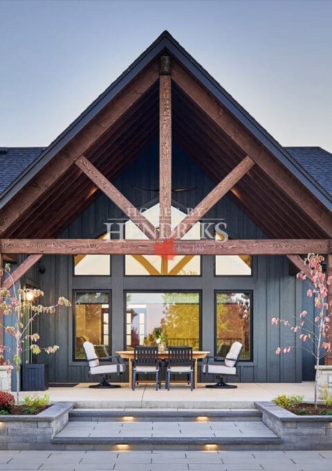 A charming timber-framed covered porch at the rear of the home, offering a perfect spot to relax and enjoy the outdoors.
